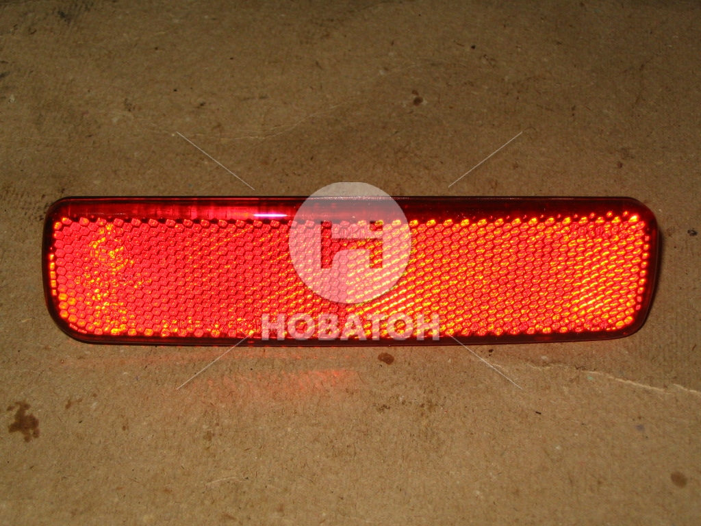 Світловідбивач ВАЗ 2111 задній лівий (низ бампера) (вир-во ДААЗ) - фото 