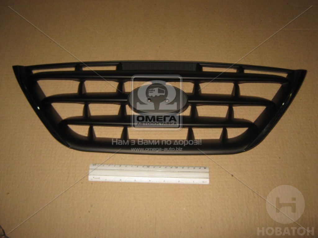 Решетка радиатора (с хромированными полосками по бокам) HYUNDAI (Хендай) ELANTRA 04-06 (TEMPEST) - фото 